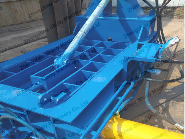 Scrap metal baler