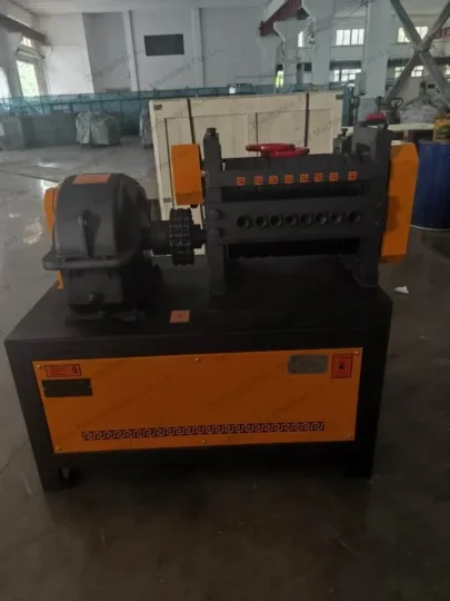 Scrap rebar straightening machine