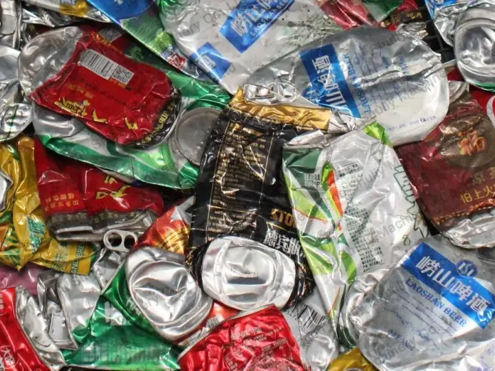 Aluminum cans processed by a can flattener